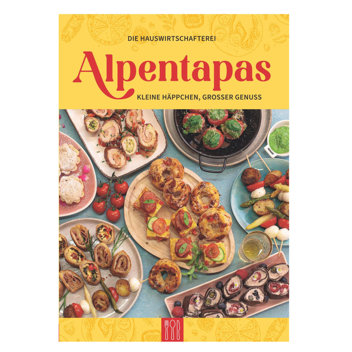 Kochbuch Alpentapas zeigt vielfältige Alpenküche mit kleinen Häppchen und Fingerfood auf mehreren Tellern.