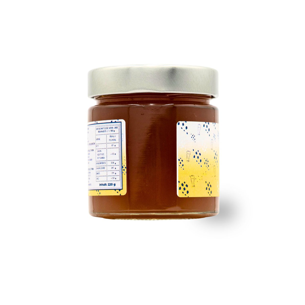 Fruchtaufstrich "Weißbier" im Glas mit goldener Flüssigkeit, weißem Etikett und silbernem Deckel.
