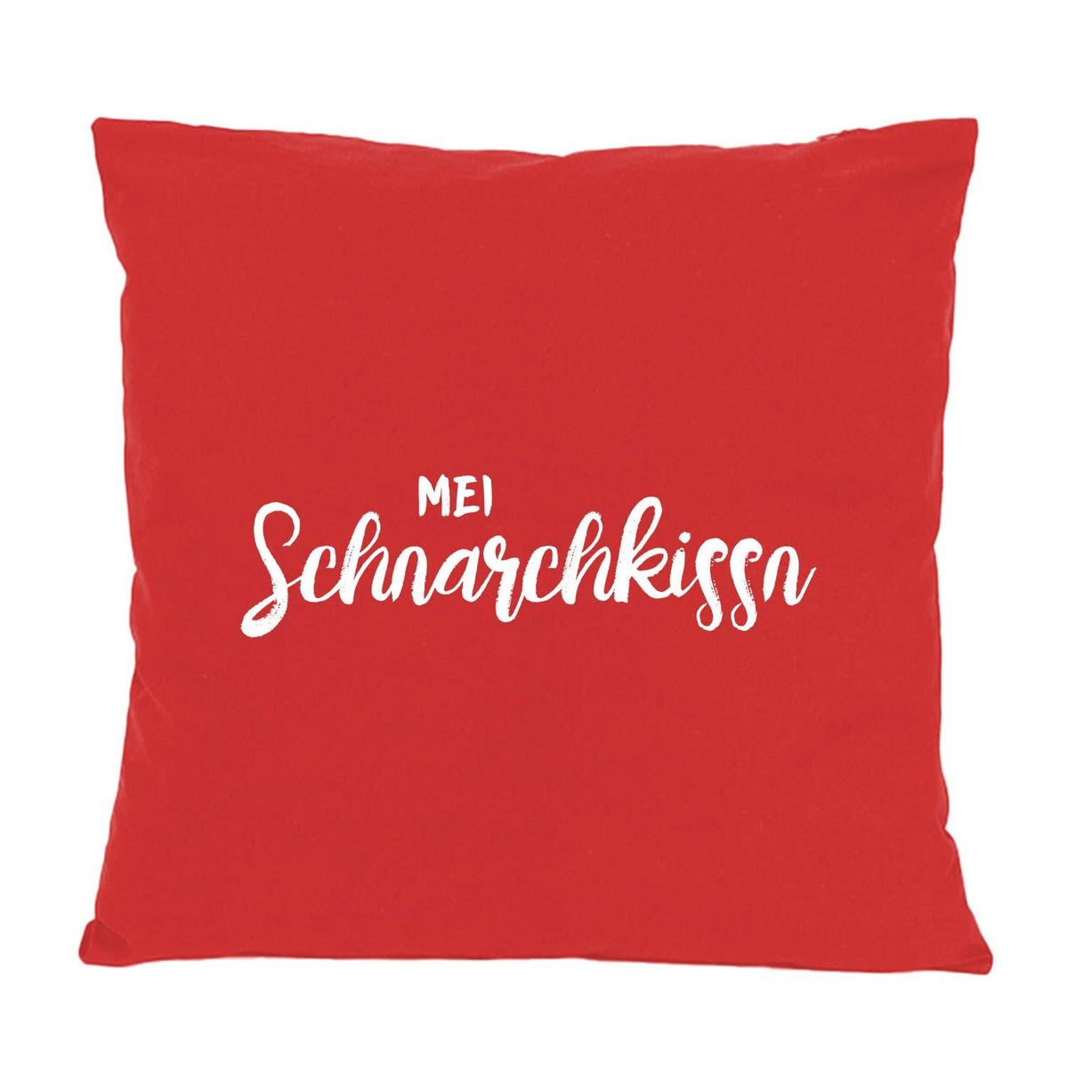 Rotes Kissen "Mei Schnarchkissn" mit weißem Schriftzug, Dekokissen für gemütliche Schlafzimmeratmosphäre.