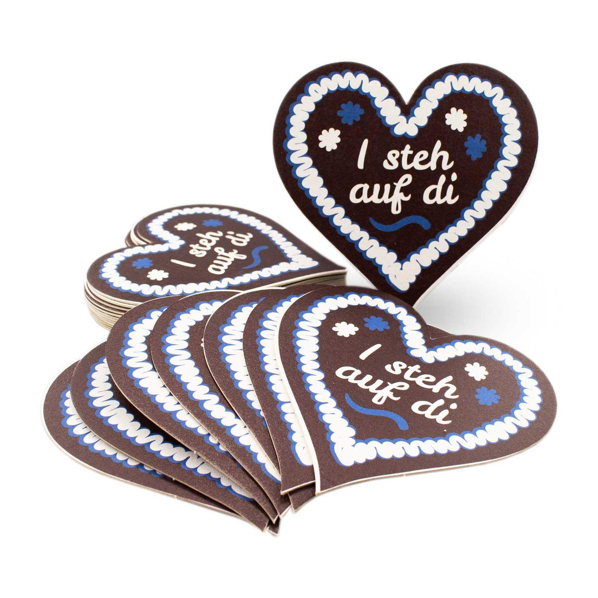 Stapel Bierfuizl-Lebkuchen-Herzen I steh auf di, braun mit weiß-blauer Zuckerguss-Optik für bayerische Feiern.