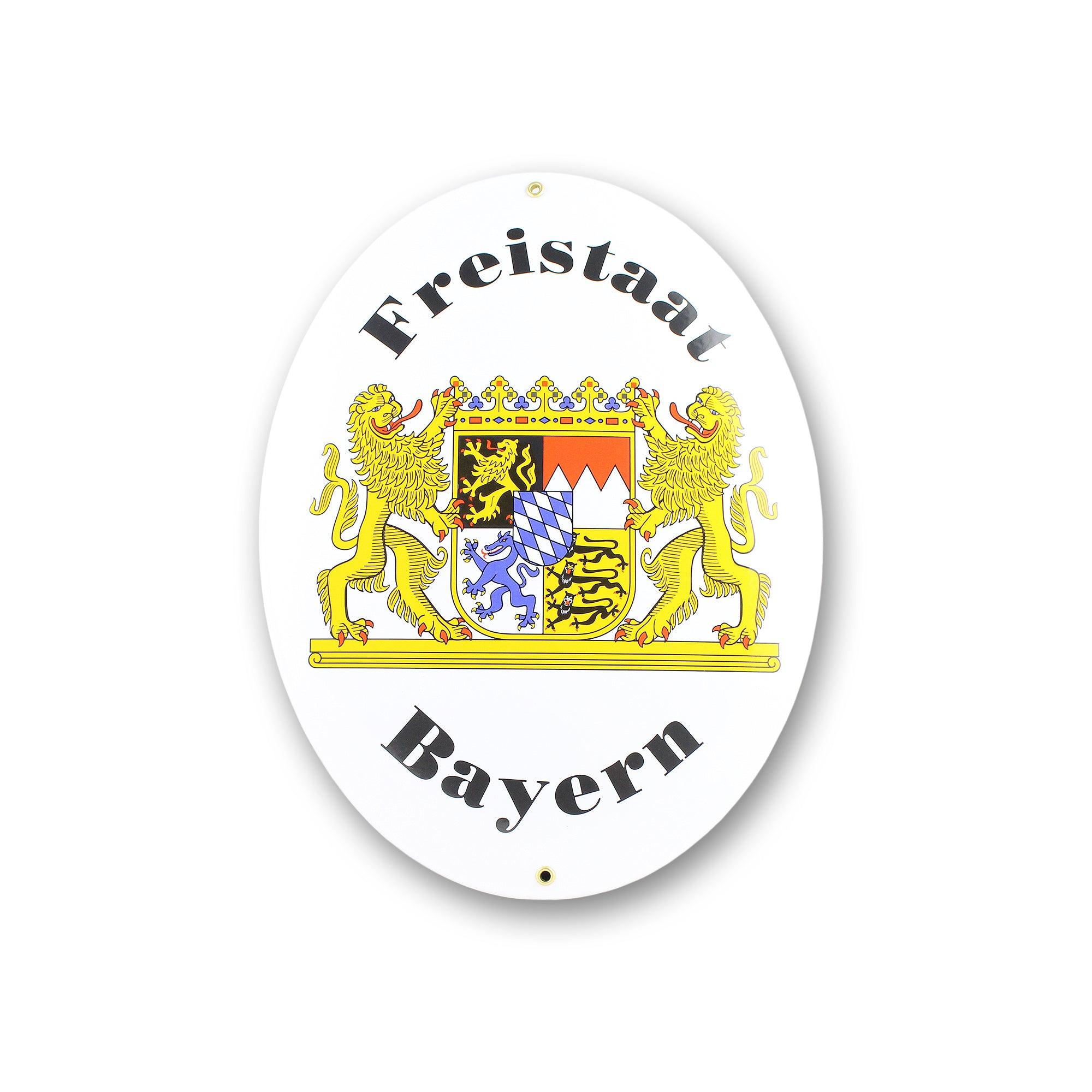 Ovales Aluminiumschild mit bayerischem Staatswappen, flankiert von goldenen Löwen, Aufschrift Freistaat Bayern.