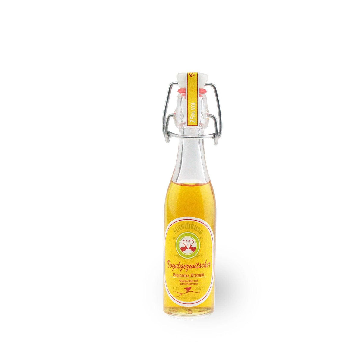 Klarer, bernsteinfarbener Vogelbeerlikör in Mini-Flasche mit rotem Etikett, Schriftzug „Vogelgezwitscher“, 25 % vol., 40 ml.