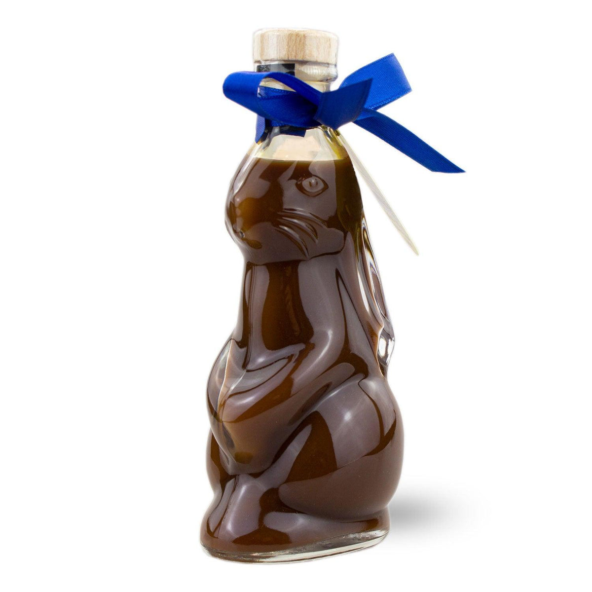 Osterhasen Schoko-Sahne-Likör in einer charmanten Hasenflasche mit blauem Band und Holzkorken.