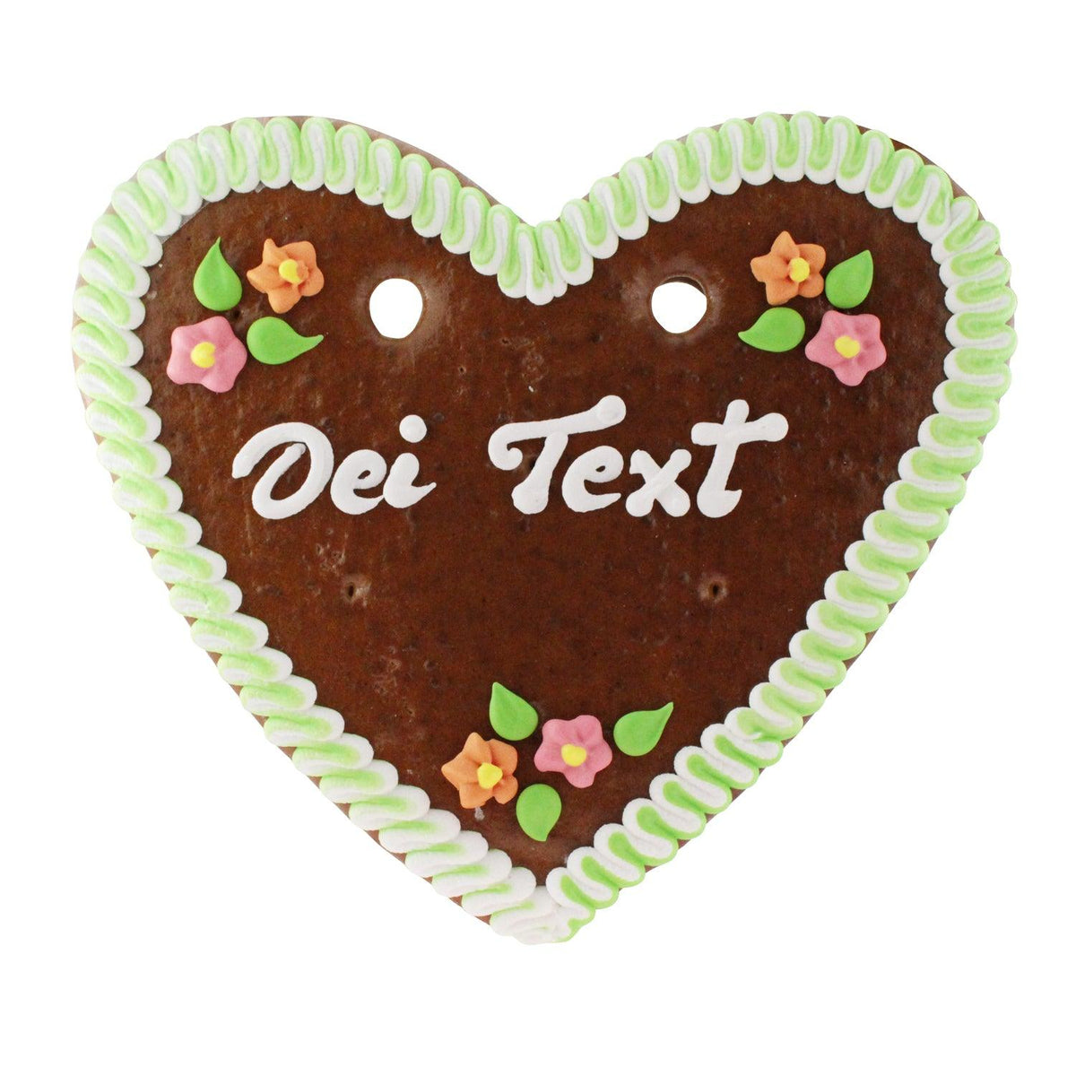 Traditionelles Lebkuchenherz mit grüner und weißer Zuckergussverzierung, bestreut mit bunten Blüten.