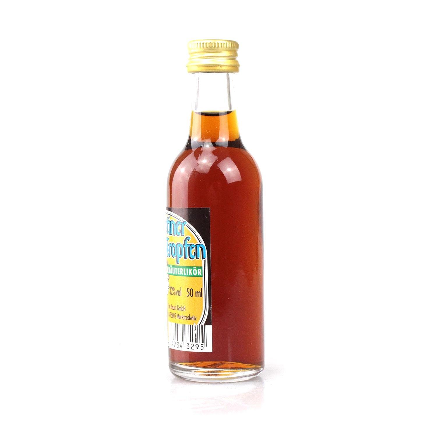 Kleine Flasche Kräuterlikör mit goldener Kappe und sichtbarem Etikett, 50 ml Fassungsvermögen.