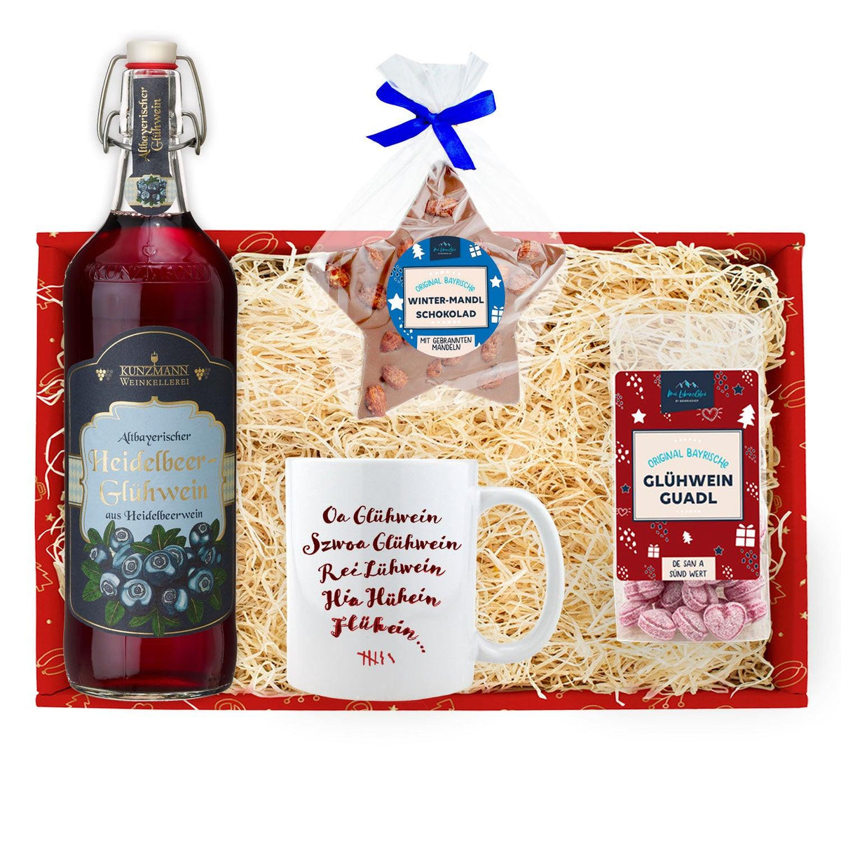 Weihnachtsbox Glühwein mit Heidelbeer-Glühwein, Schokolade, Tasse und Glühwein-Guadl in roter Geschenkbox.