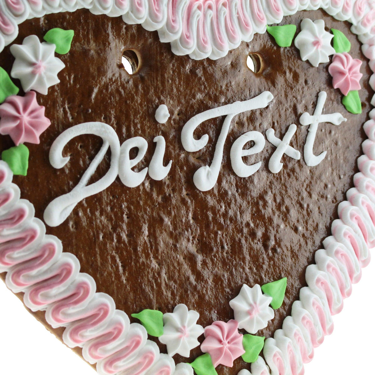 Lebkuchenherz mit individuell gestaltbarem Schriftzug "Dei Text", verziert mit rosa-weißem Zuckerguss und bunten Blüten