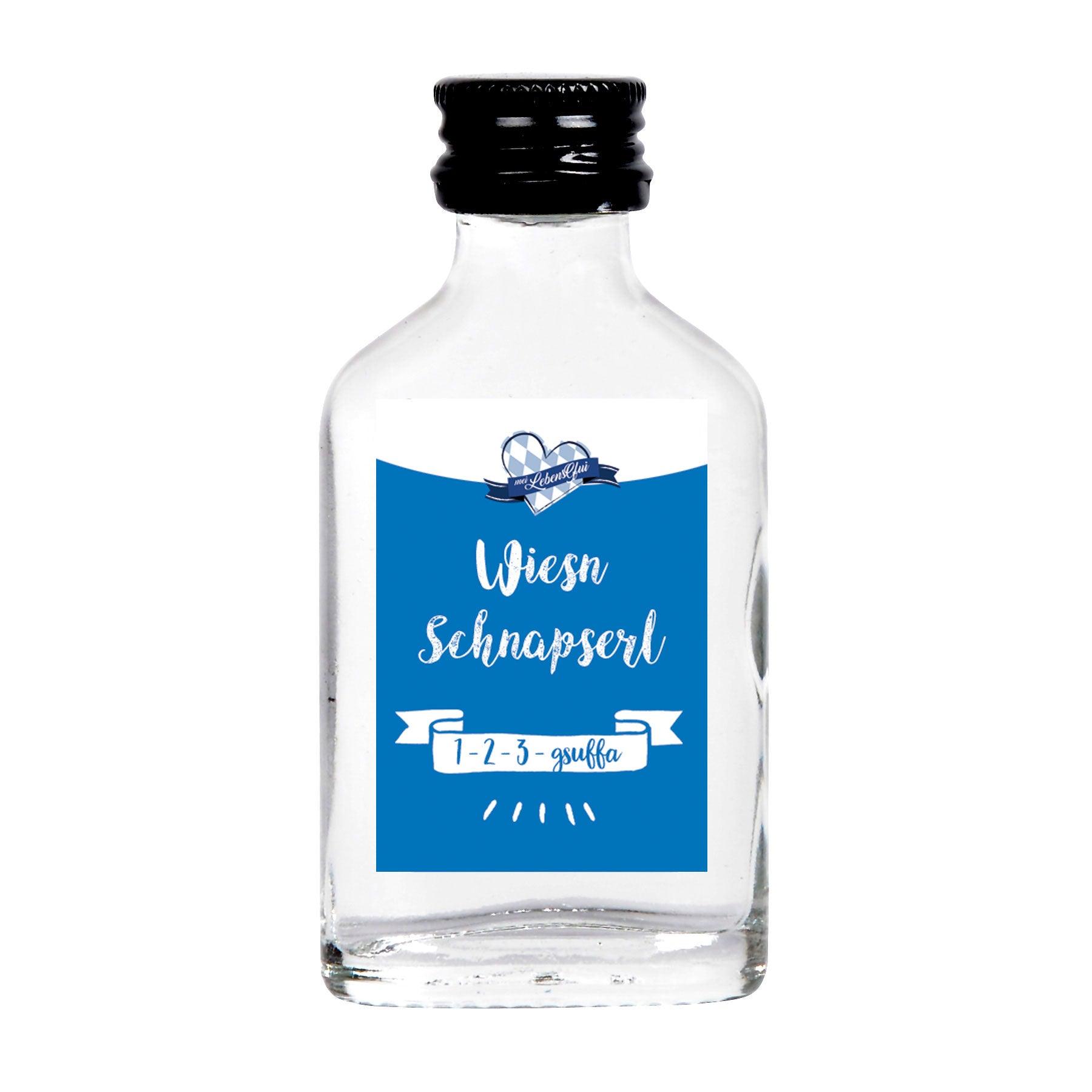 Kleine Schnapsflasche "Wiesn Schnapserl" mit blauem Etikett und weißer Schrift, Teil der Oktoberfest-Box Spaten 2