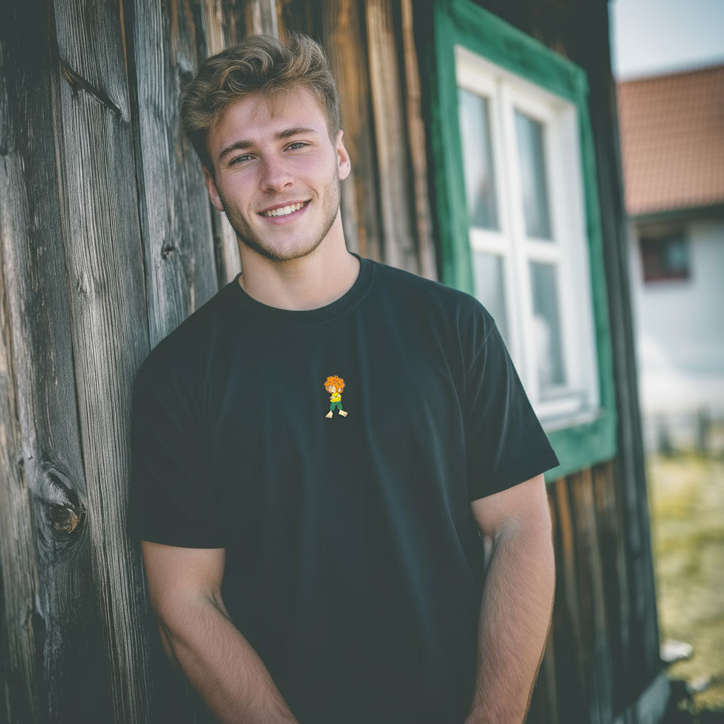 Mann im schwarzen Pumuckl T-Shirt „Grantla“
