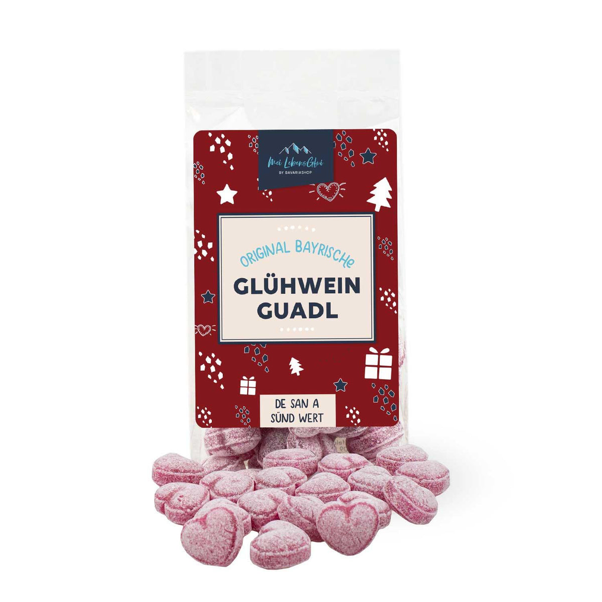 Packung Boarische Glühwein-Guadl mit pinken, herzförmigen Bonbons und weihnachtlichem Etikett.