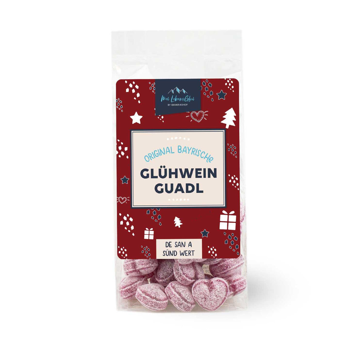Transparente Tüte mit Boarische Glühwein-Guadl, herzförmig mit winterlicher Etikettgestaltung auf rotem Grund.