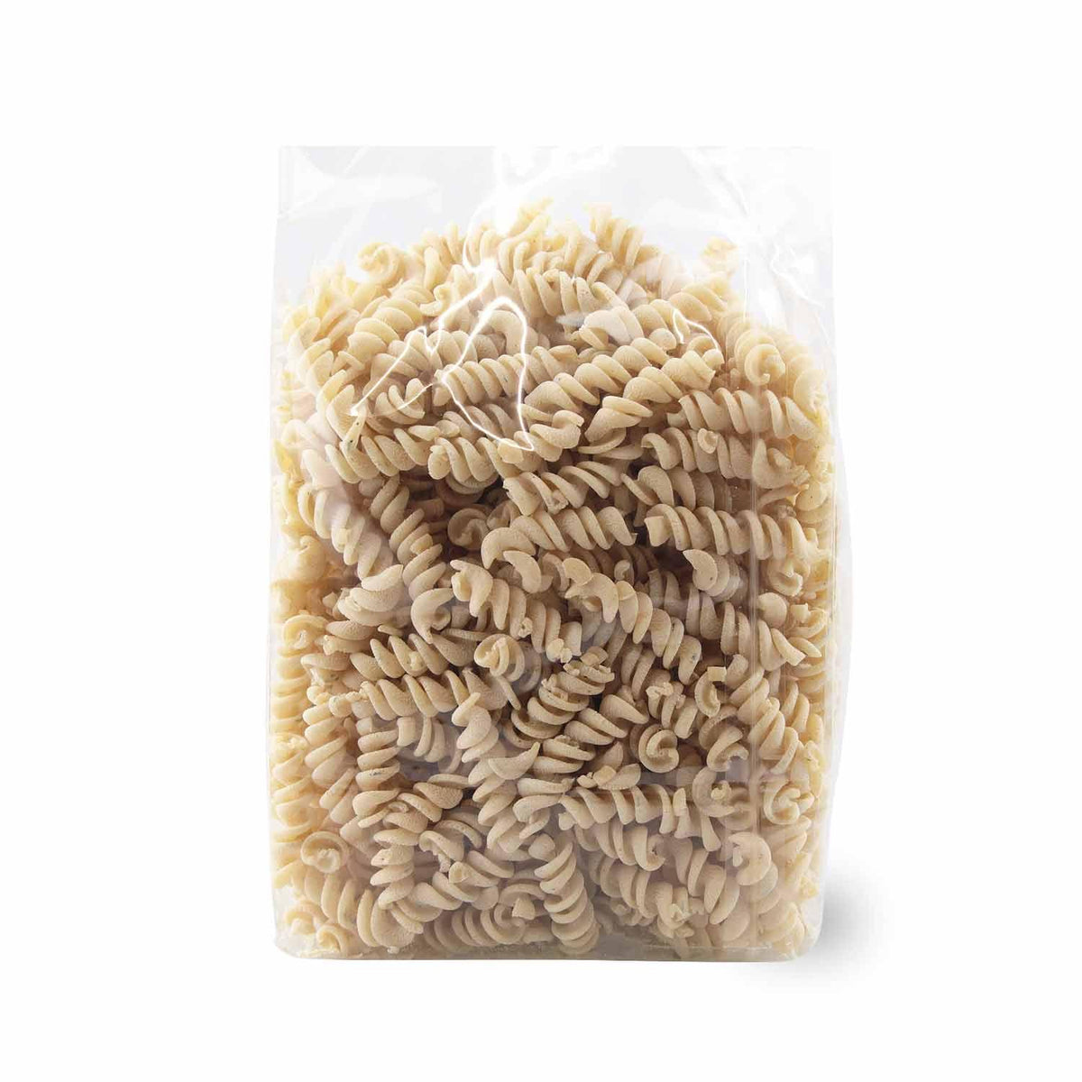 Boarische Weißwurscht-Nudeln in transparenter Verpackung, hellbraune Fusilli Trockennudeln bereit zum Kochen.