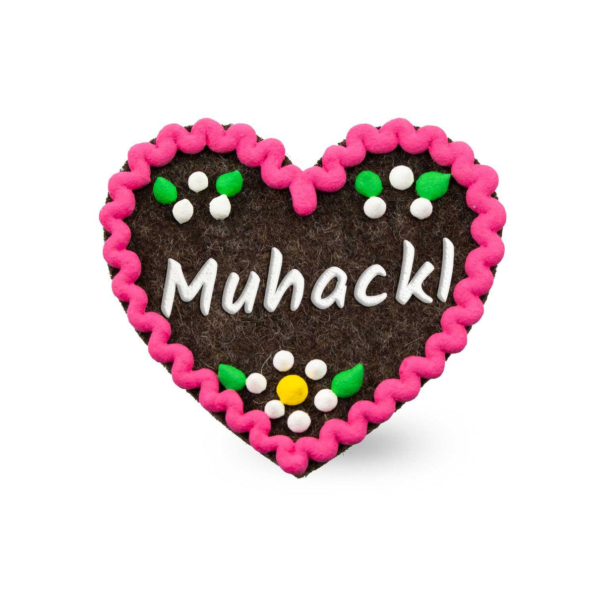 Brauner Filzherz-Anstecker Muhackl mit rosa wellenförmiger Umrandung und bunten Details.