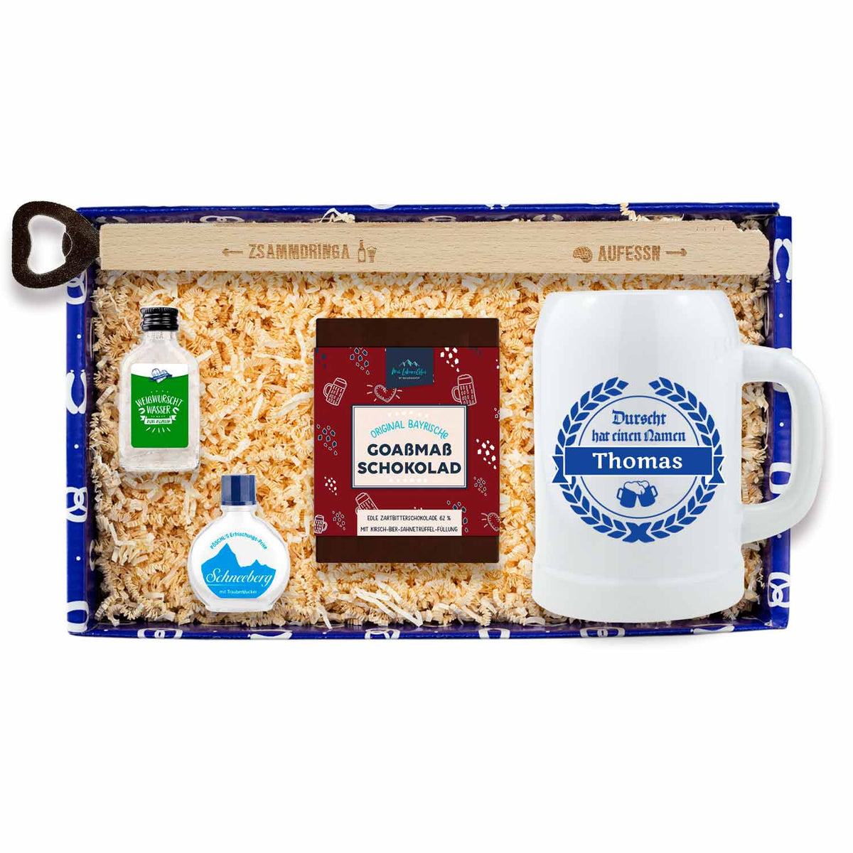 Geschenkbox Des braucht a Mo mit Bierkrug, Schokolade, Wammerl-Wasser und Schneeberg-Traubenzucker.