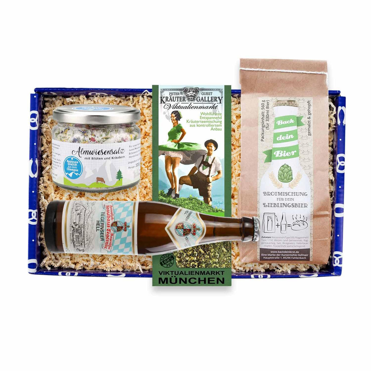 Geschenkbox Ois Guade zum Einzug mit Almwiesensalz, Kräutertee, Bier und Brotbackmischung, perfekt fürs neue Zuhause.