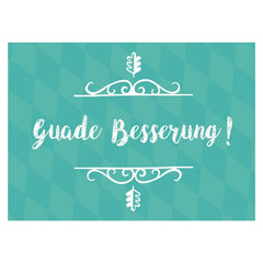 Grußkarte "Guade Besserung!" auf türkisem Hintergrund mit weißen Schnörkeln und Eichenblättern, im bayerischen Stil.