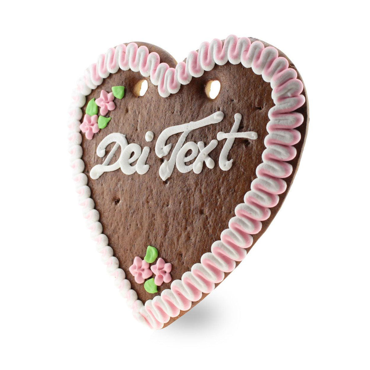 Lebkuchenherz mit weißer und pinker Zuckerguss-Verzierung, kleinen Blumen und Platz für individuelle Beschriftung.