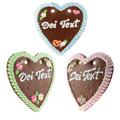 Drei braune Lebkuchenherzen mit personalisierbarer weißer Aufschrift Dei Text und bunten Randverzierungen, Blumen und Brezel.