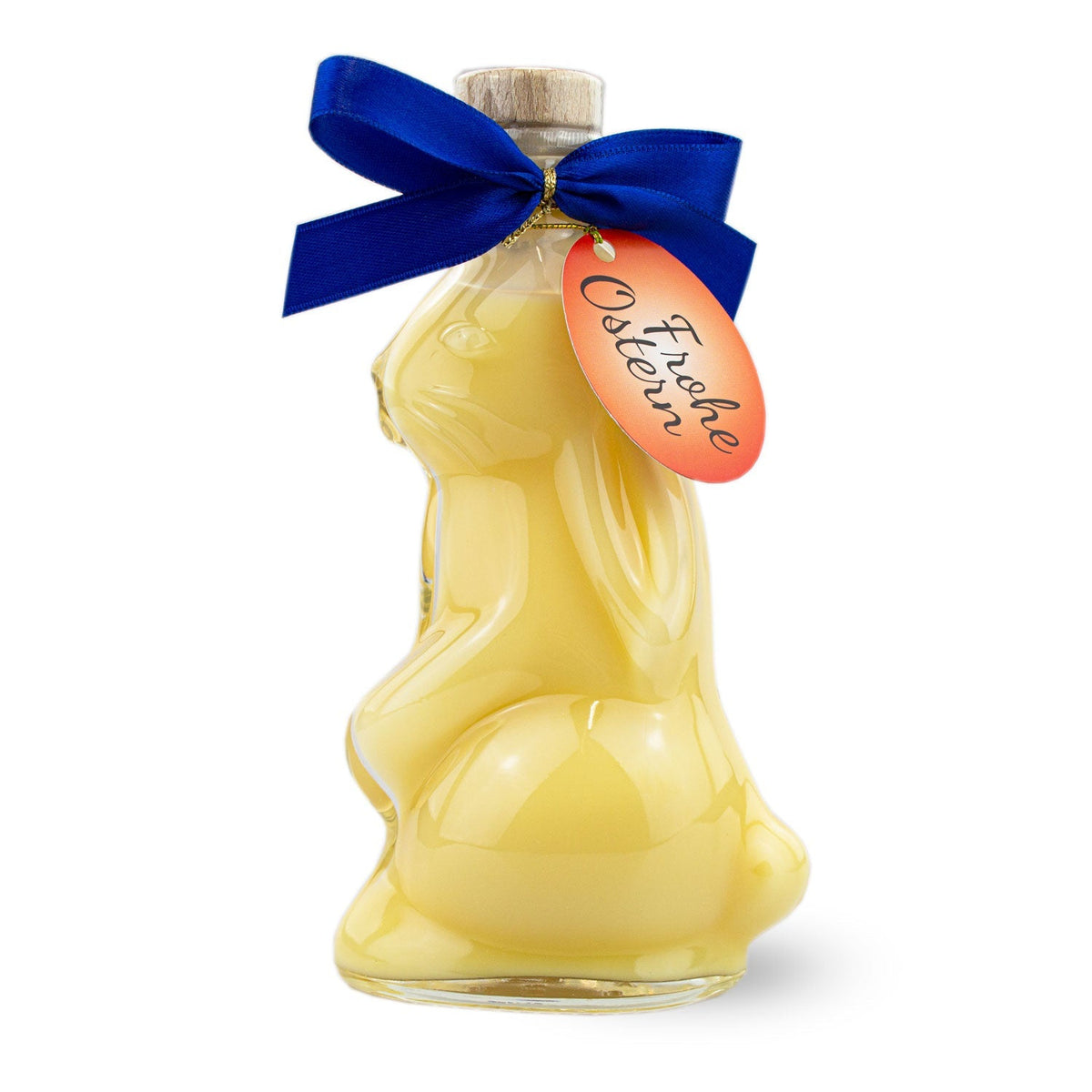 Gelber Osterhasen Eierlikör in Hasenflasche mit blauem Band und frohe Ostern Anhänger.