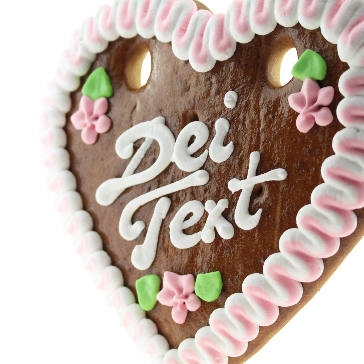 Lebkuchenherz mit weißer Zuckerguss-Schrift "Dein Text", rosa Blüten und grünen Blättern verziert, mit Loch zum Aufhängen.