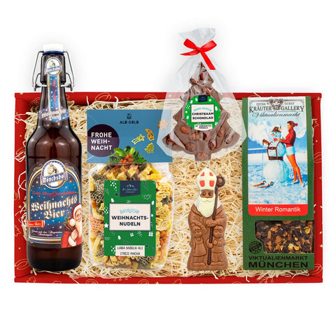 Weihnachtsbox "Tannenbaam" mit Bier, Schokolade, Tee, winterlichen Nudeln und festlichen Leckereien.