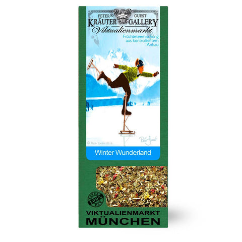 Grüne Packung von Winter Wunderland Tee mit einer Eiskunstläufer-Grafik und sichtbarer Früchteteemischung.